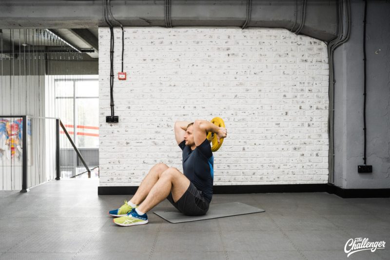 Круговая тренировка с дисками от штанги: 7 эффективных упражнений. Изображение номер 3